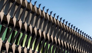 A striking pattern of steel blades give the new ABC Brisbane Accommodation building its striking exterior identity.